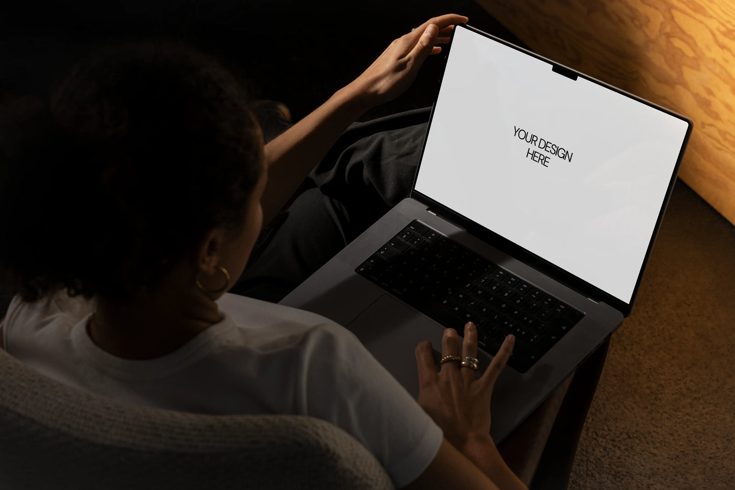 Laptop web UI PSD mockup shown in a minimal workspace top view