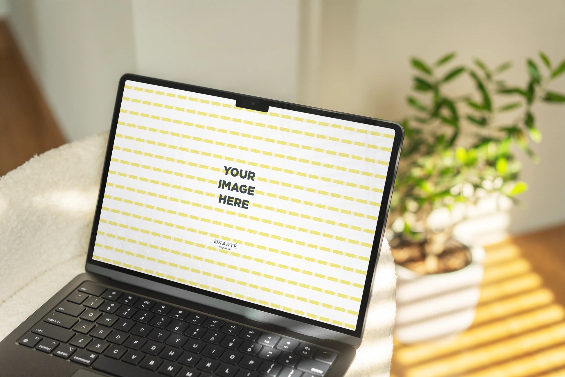 Scandinavian MacBook mockup with vase and minimalist decor