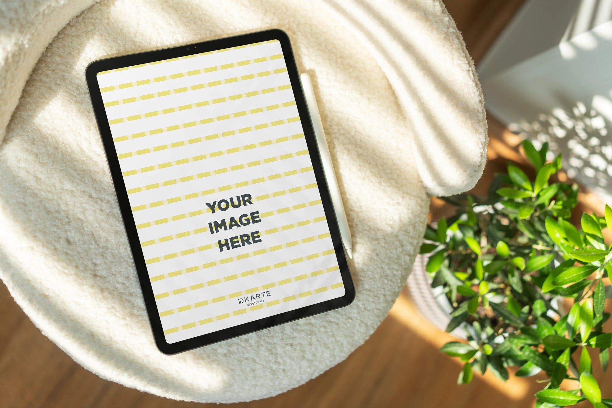 Apple laptop PSD mockup on round table interior scene