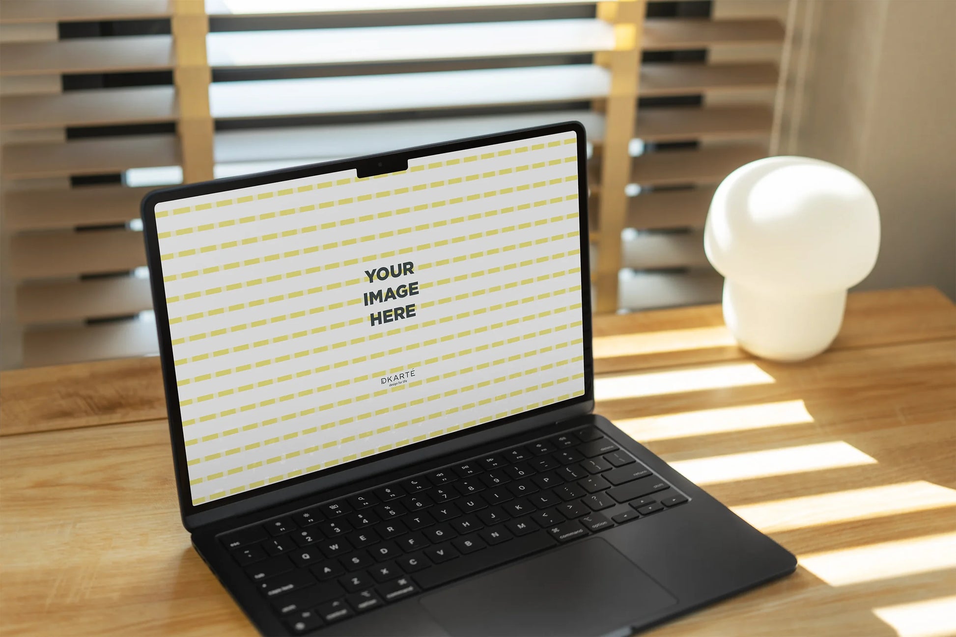 Apple laptop PSD mockup with plants and sunlight