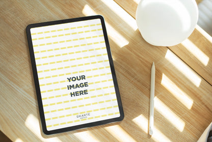 MacBook PSD mockup on wooden table minimal interior