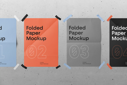 Multi color folded paper poster mockup in flat lay scene