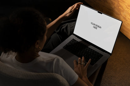 Laptop web UI PSD mockup shown in a minimal workspace top view